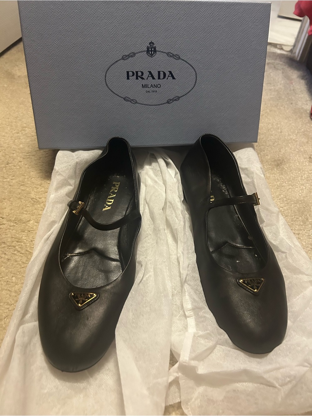 AUTHENTIC PRADA black leather Mary Jane flats.
